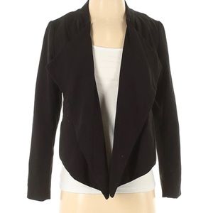 Cropped style black, H&M blazer. Blue silk inside, buttons on sleeves
